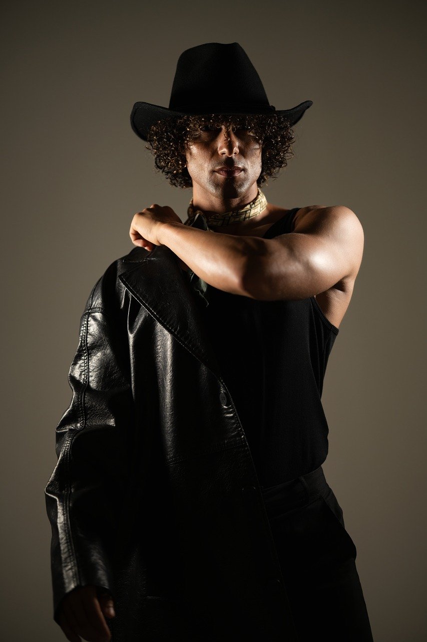 male, fashion, portrait, editorial, lighting, outfit, man, masculinity, photography, bold, pose, jacket, hair, creative, fashion, aesthetic, studio, mysterious, contrast, artistic